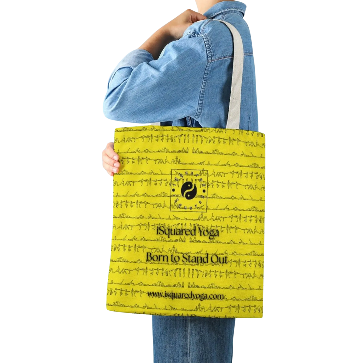 Yellow tote bag featuring a printed design of yoga postures, carried by a person wearing a denim jacket.