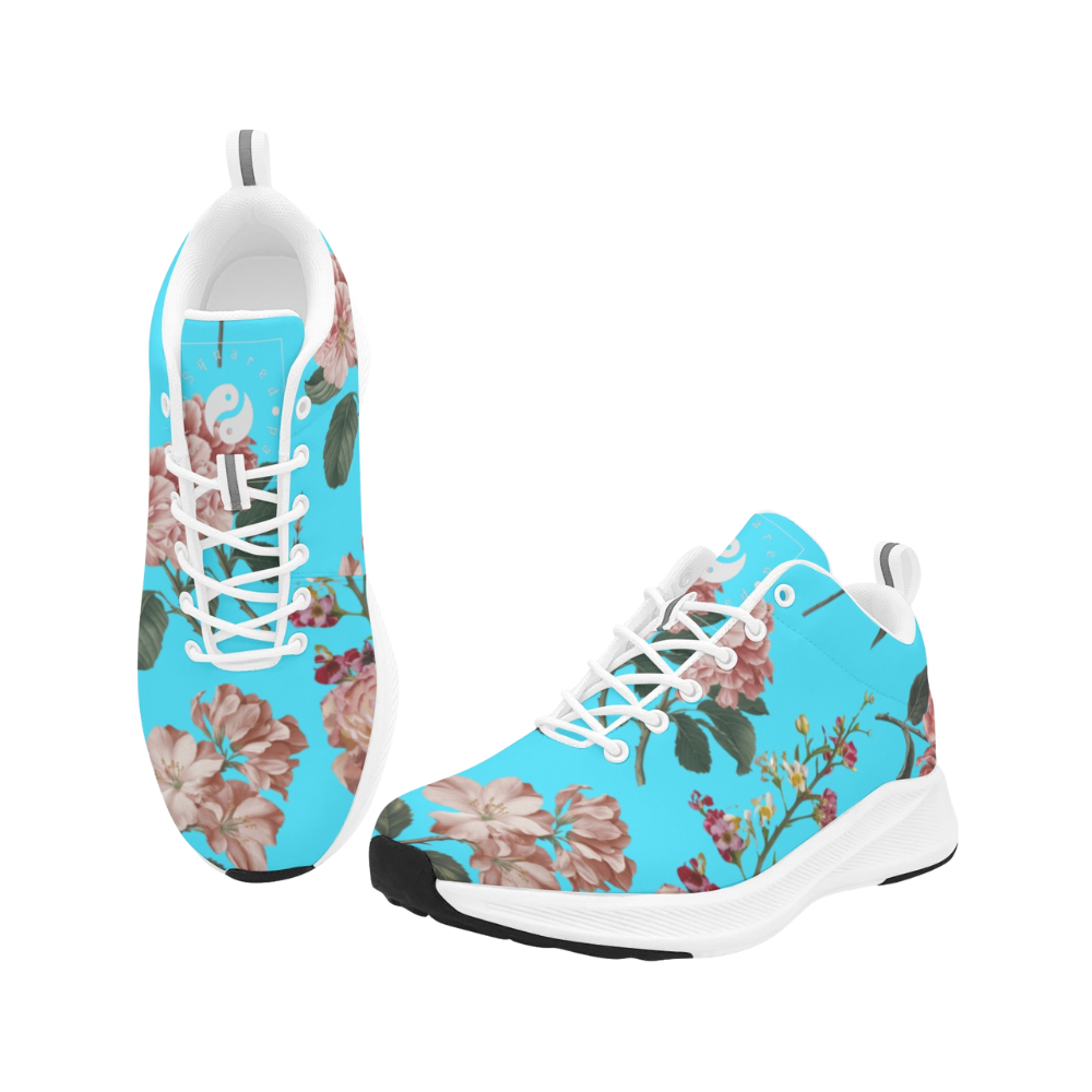 Vibrant turquoise running shoes featuring a floral print, white laces, and black rubber outsole.