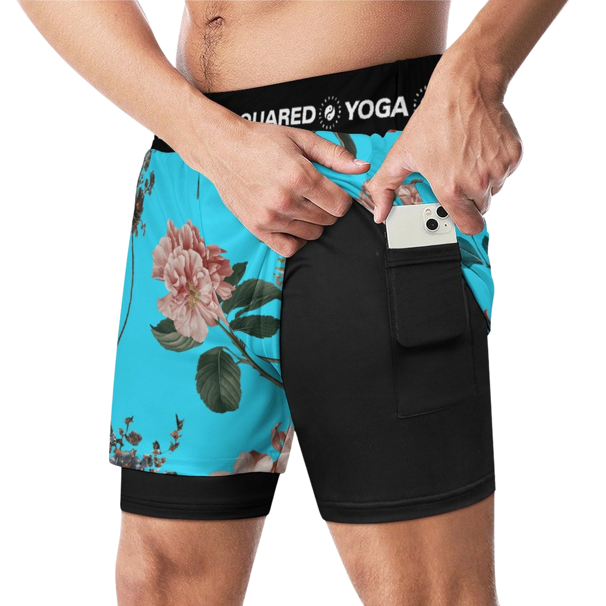 Compression yoga shorts in turquoise with a floral print, featuring a black waistband and side pocket for storage.