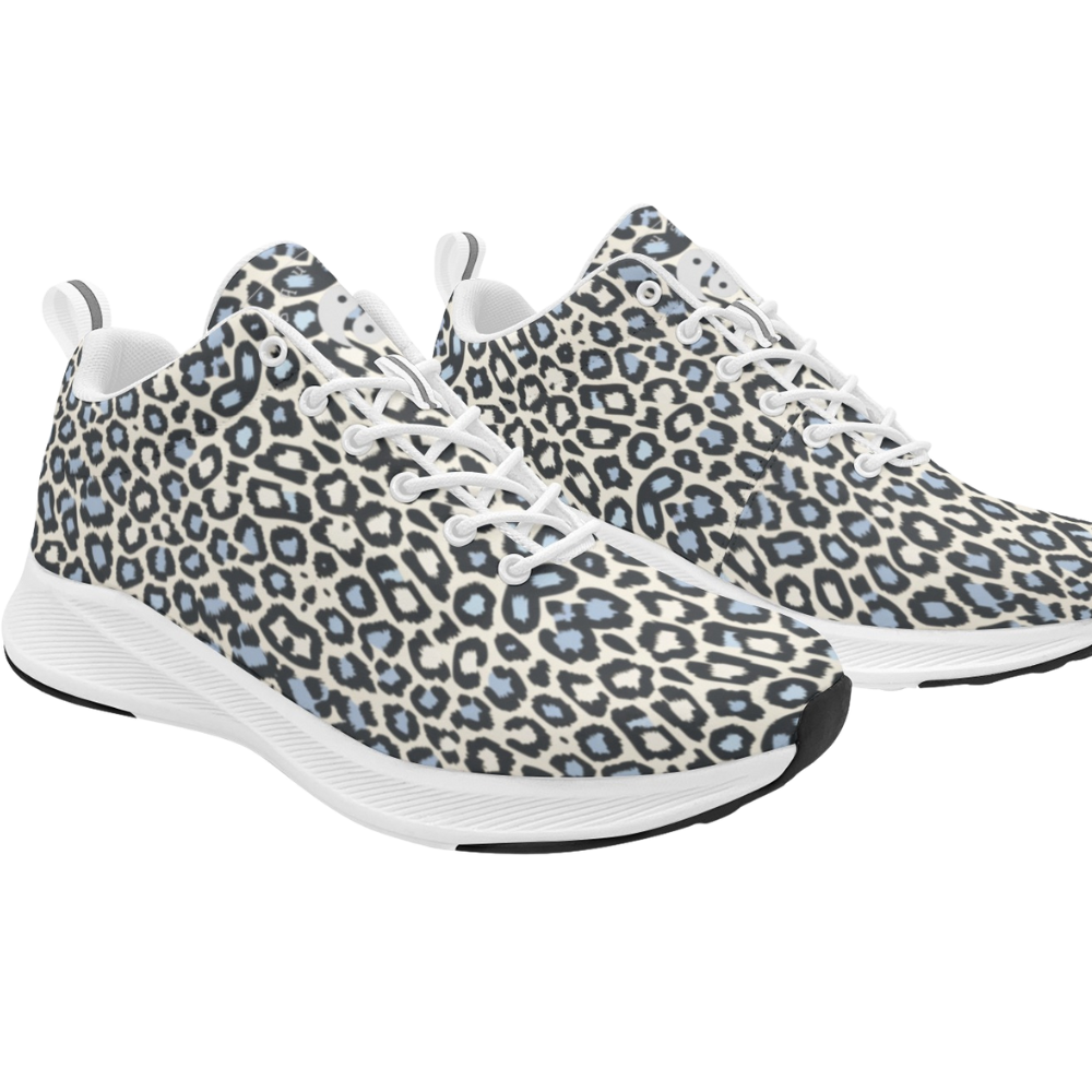 Wild Leopards iSquared Women Runners featuring a blue and black leopard print on a light beige background with white soles.