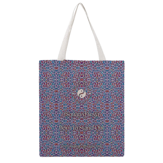 Tote bag featuring a colorful wild leopard print in purple, pink, and blue hues with white shoulder straps.