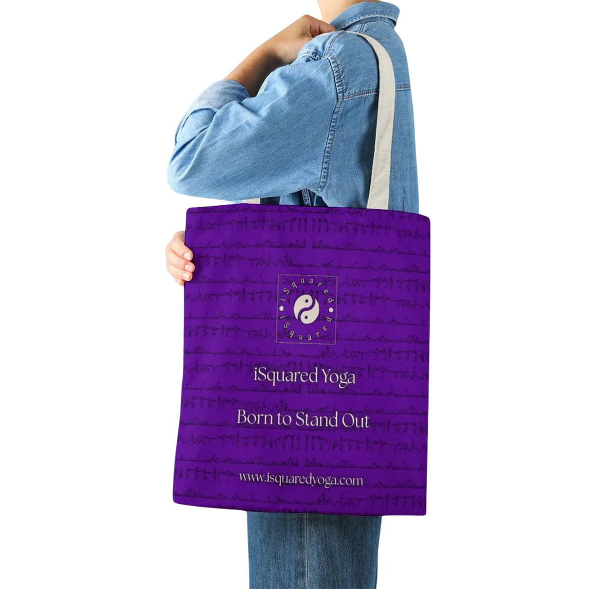 Purple tote bag with double-sided artwork, carrying the iSquared Yoga logo and "Born to Stand Out" text, worn over the shoulder.