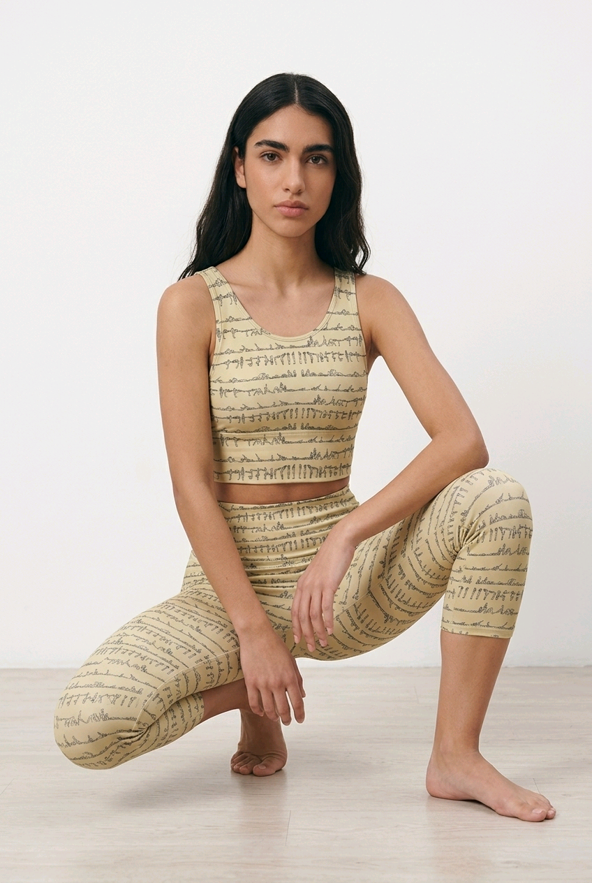Bikram Pastel iSquared Pocket Capri leggings with high-rise waistband, mid-calf fit, and dual side pockets