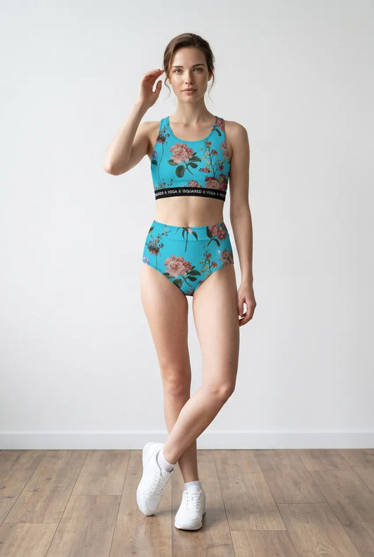 Vibrant turquoise hot yoga bikini set features a floral pattern, with a cropped top and high-waisted bottoms.