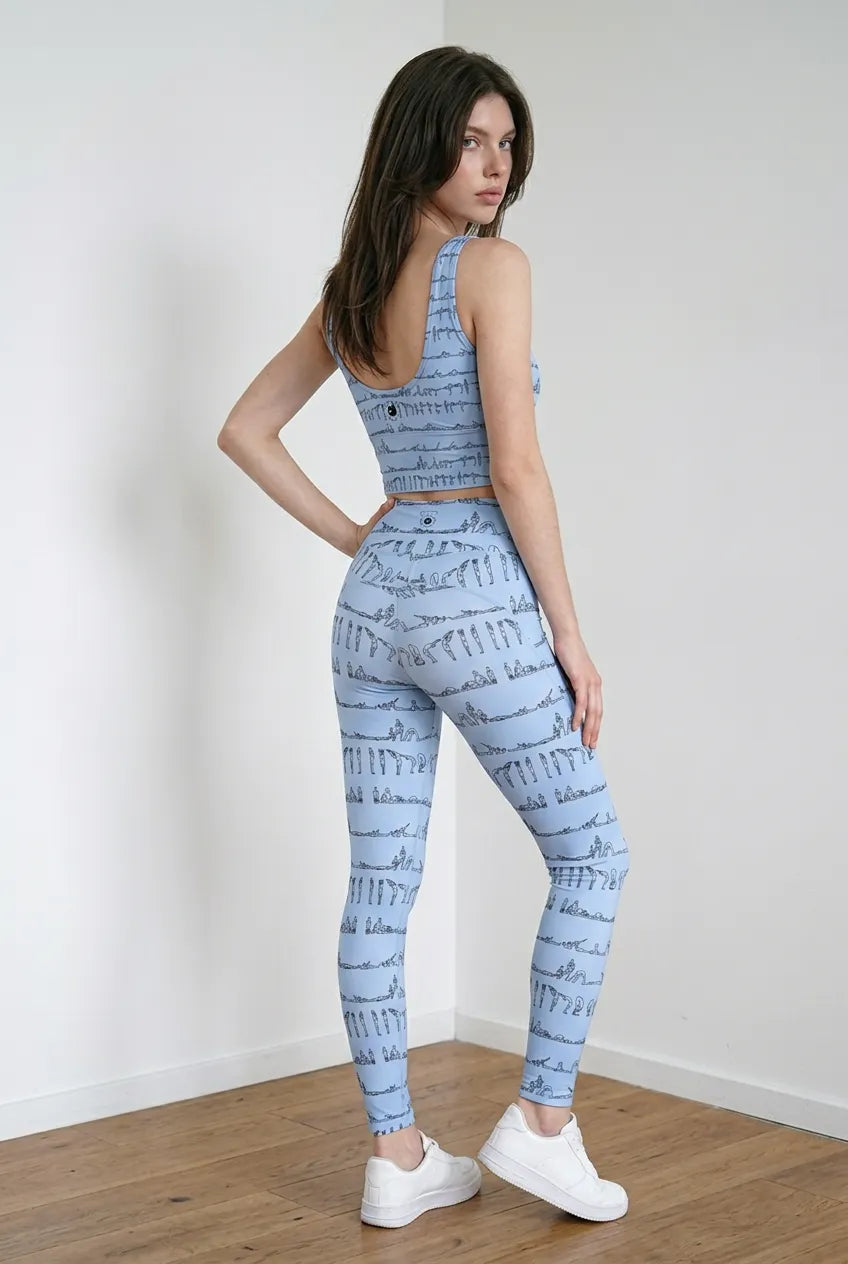 Bikram Pastel iSquared Pocket Leggings in cream with black yoga poses print, featuring a high-rise waistband and side pocket.