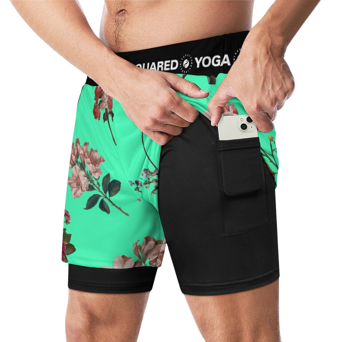 Compression yoga shorts in vibrant turquoise with floral prints, featuring a black waistband and discreet side pocket.