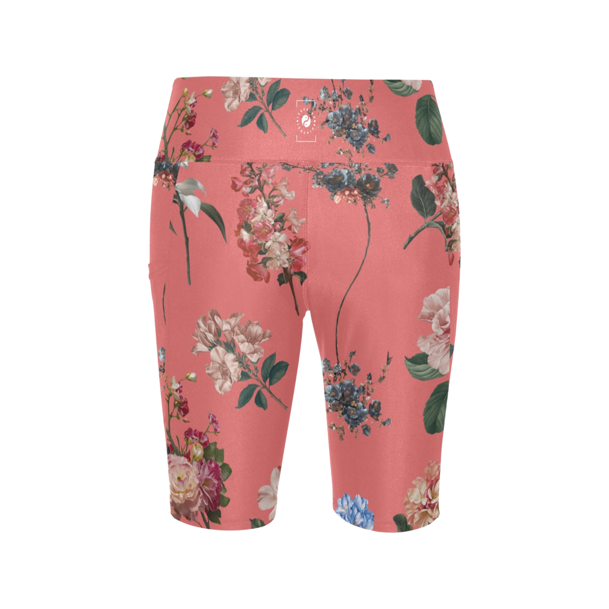 High-waisted, biker-length shorts in vibrant coral with a floral pattern featuring various colors and leaves.