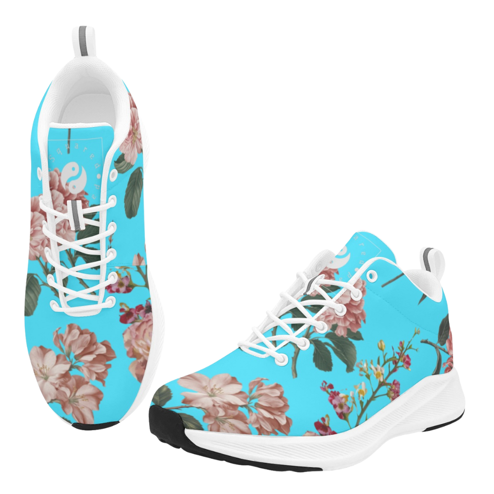Bright turquoise iSquared Women Runners featuring a floral botanical print, white laces, and a black rubber sole.