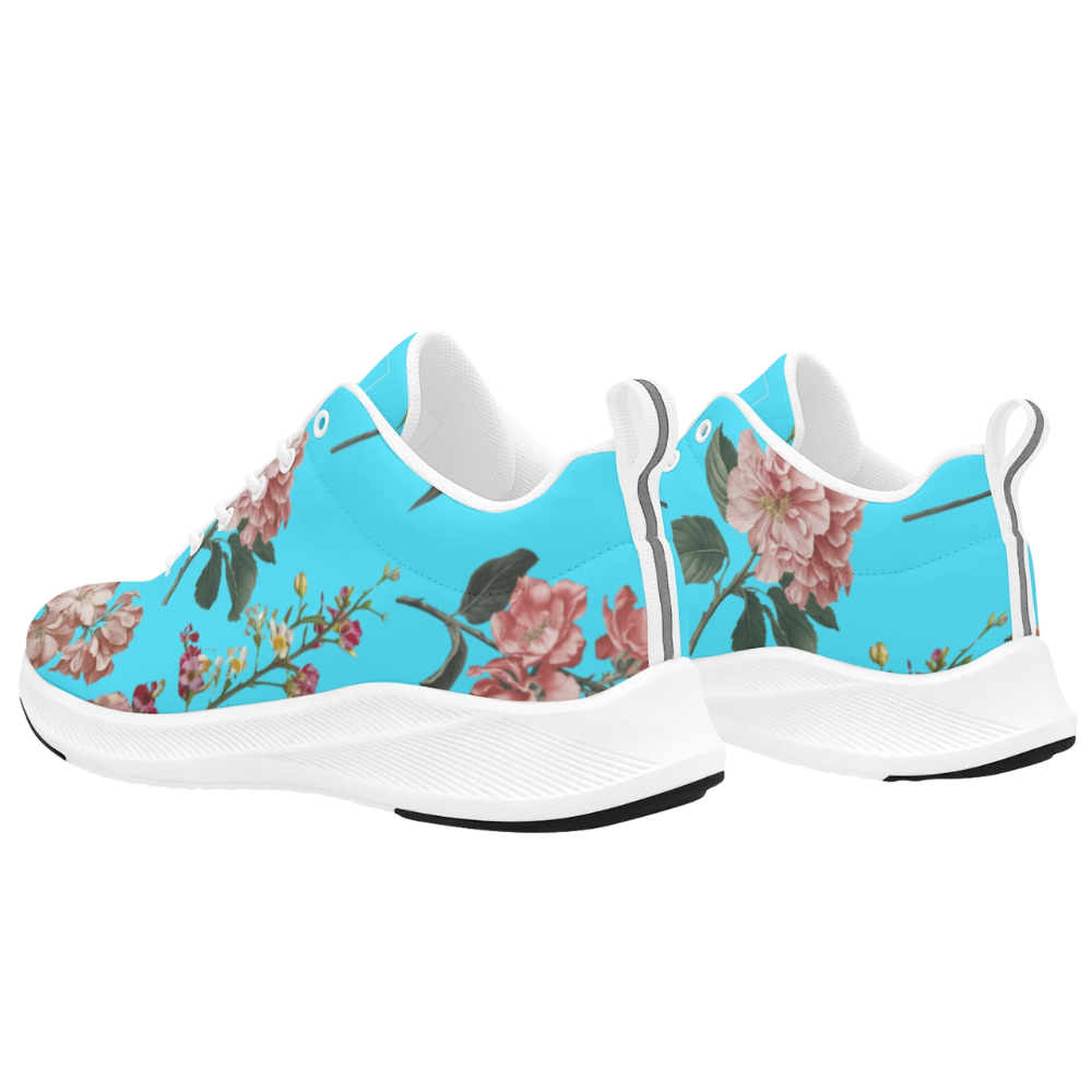 Vibrant turquoise iSquared Women Runners with floral prints, white soles, and a sleek design for everyday wear.