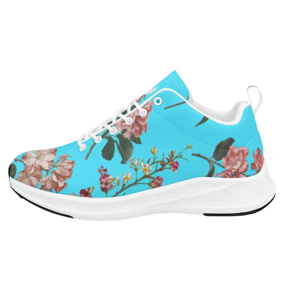 Botanicals iSquared Women Runners in refreshing turquoise with floral prints, featuring a white sole and laces.