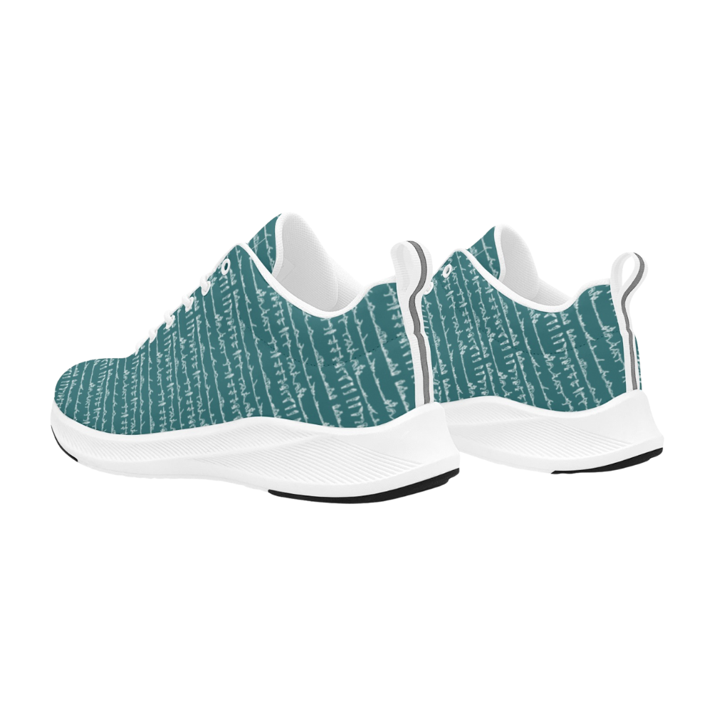 Teal running shoes featuring a textured pattern, breathable faux suede, and white sole. Designed for comfort and style.