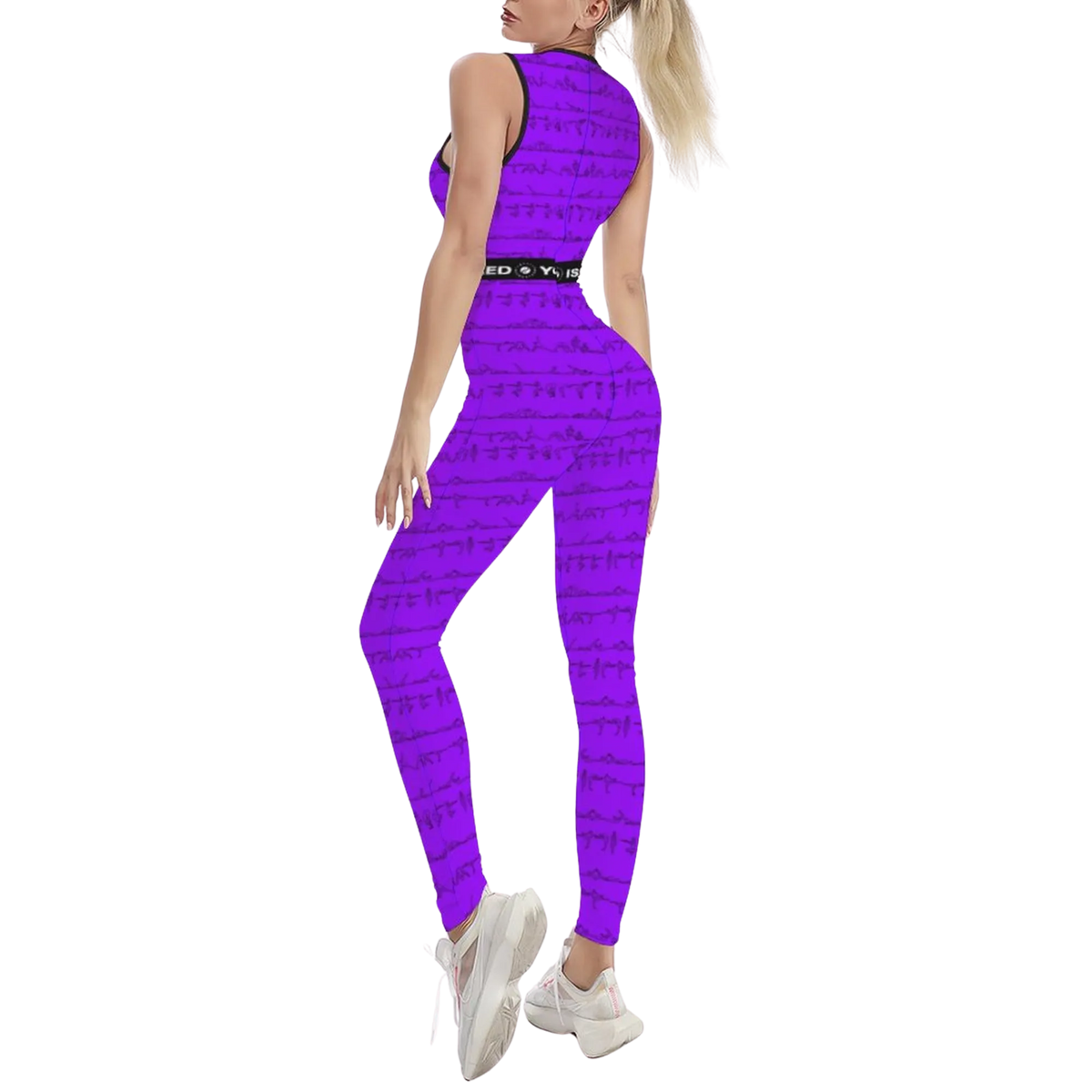 Sleeveless purple all-over print jumpsuit with body-contouring fit, worn with a black belt and white sneakers.