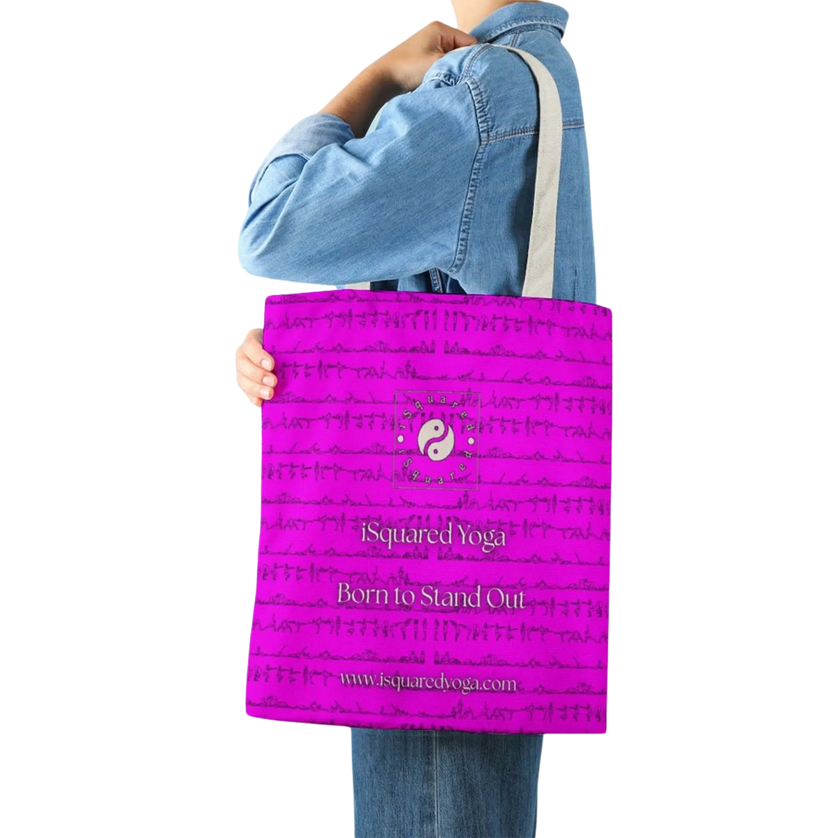 Vibrant pink tote bag with artistic design, featuring text "Born to Stand Out," held by a model wearing a denim shirt.