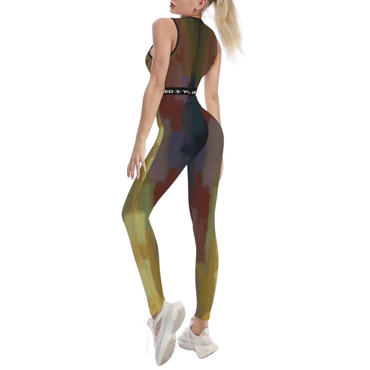 Sleeveless iSquared Jumpsuit in a multicolor pattern, featuring a body-contouring fit and paired with white sneakers.