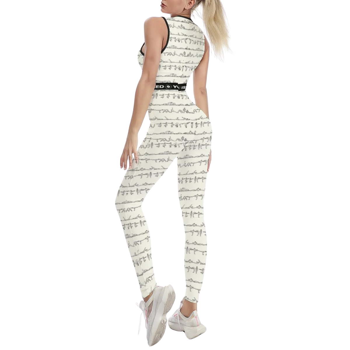 Sleeveless ivory jumpsuit featuring a unique Bikram yoga print, worn with white sneakers, showcasing a fitted silhouette.