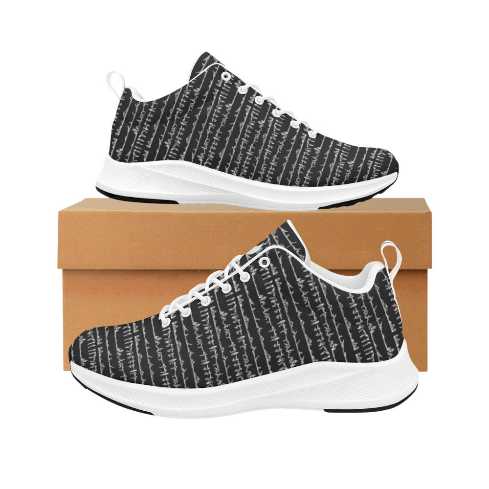 Black and white patterned iSquared Men Runners with textured design, set on a tan shoe box.