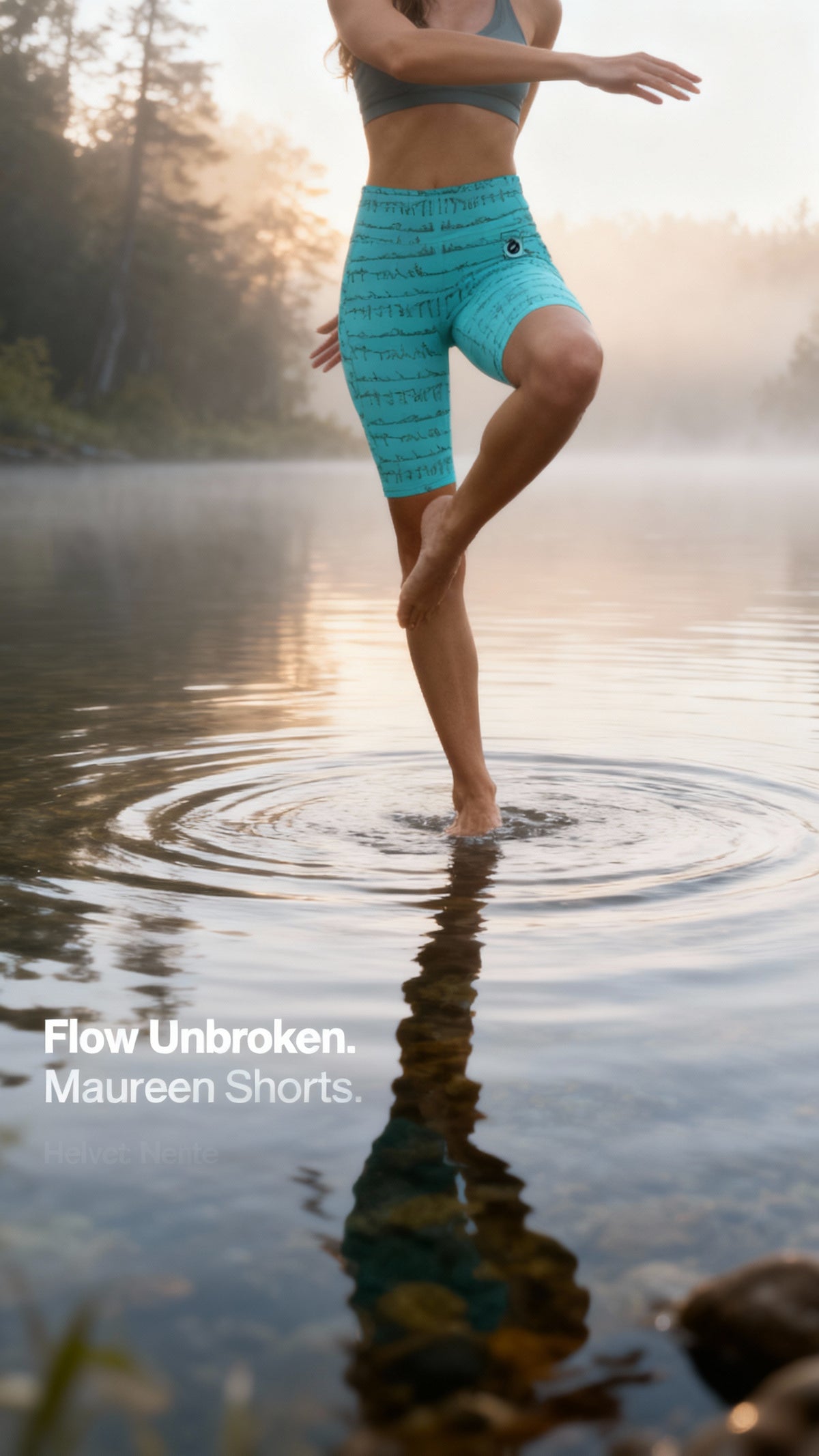 Turquoise high-waisted biker shorts with a textured pattern, worn by a model standing in water, showcasing flexibility.