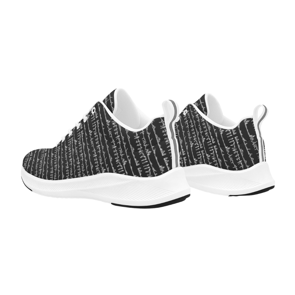 Bikram Ember iSquared Men Runners feature a textured black and white pattern with a breathable faux suede design.