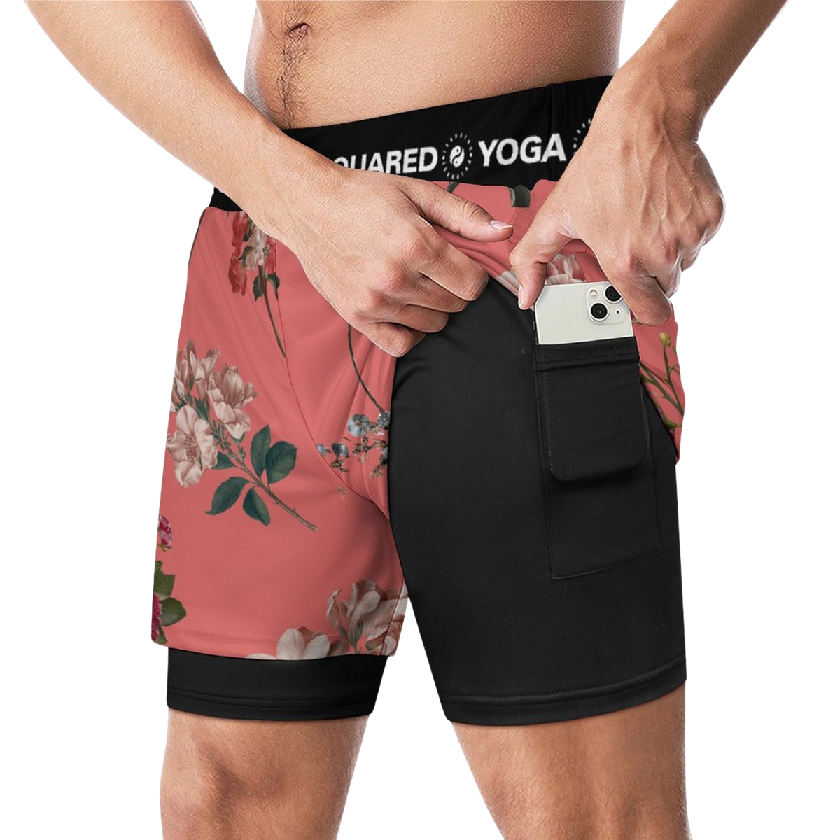 Compression yoga shorts in vibrant coral with floral print, featuring a side pocket and elastic waistband for a custom fit.