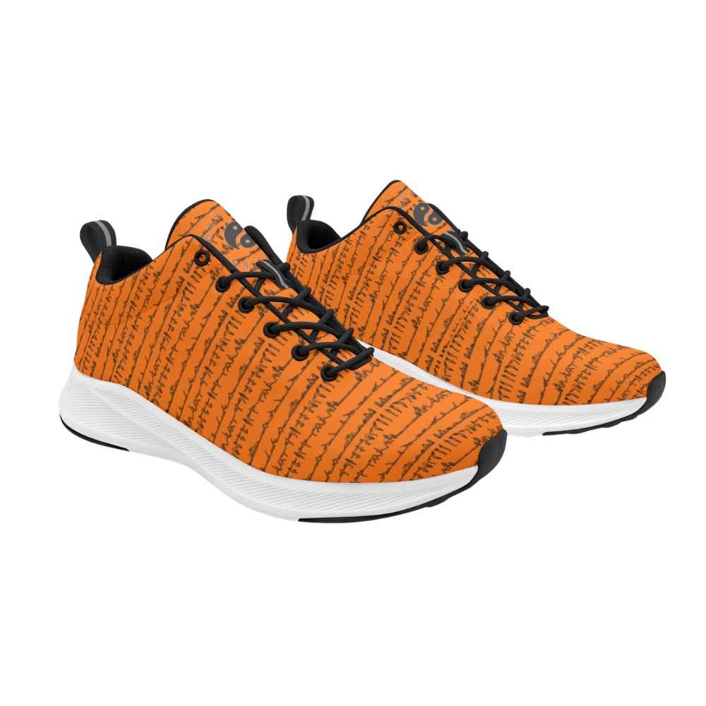 Bright orange sneakers featuring a textured pattern with black accents, designed for comfort and style in daily wear.