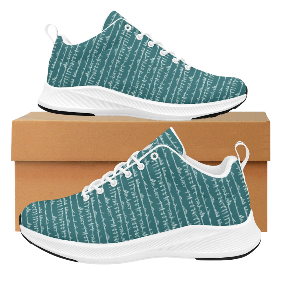 Bikram Ember iSquared Women Runners in teal with white geometric patterns, displayed on a brown box.
