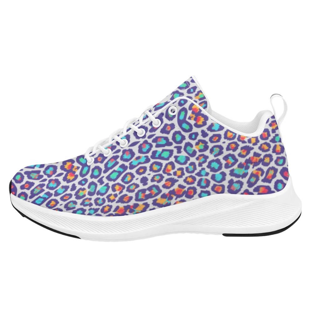 Women's iSquared Runners in vibrant wild leopard print with colorful spots on a white sole, featuring breathable material.