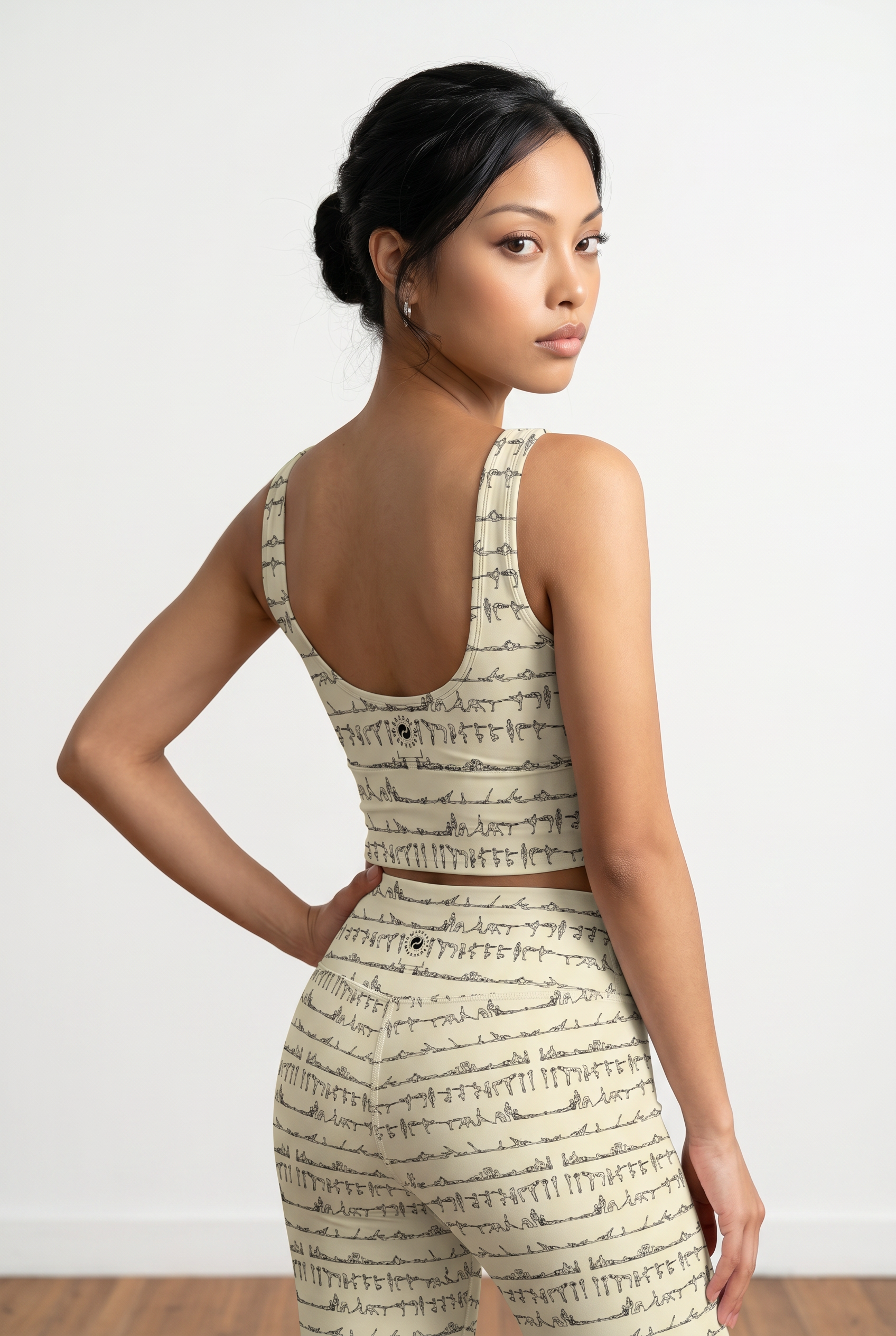 Bikram Pastel iSquared Crop Top with U-back, removable pads, cropped fit, and pastel all-over print