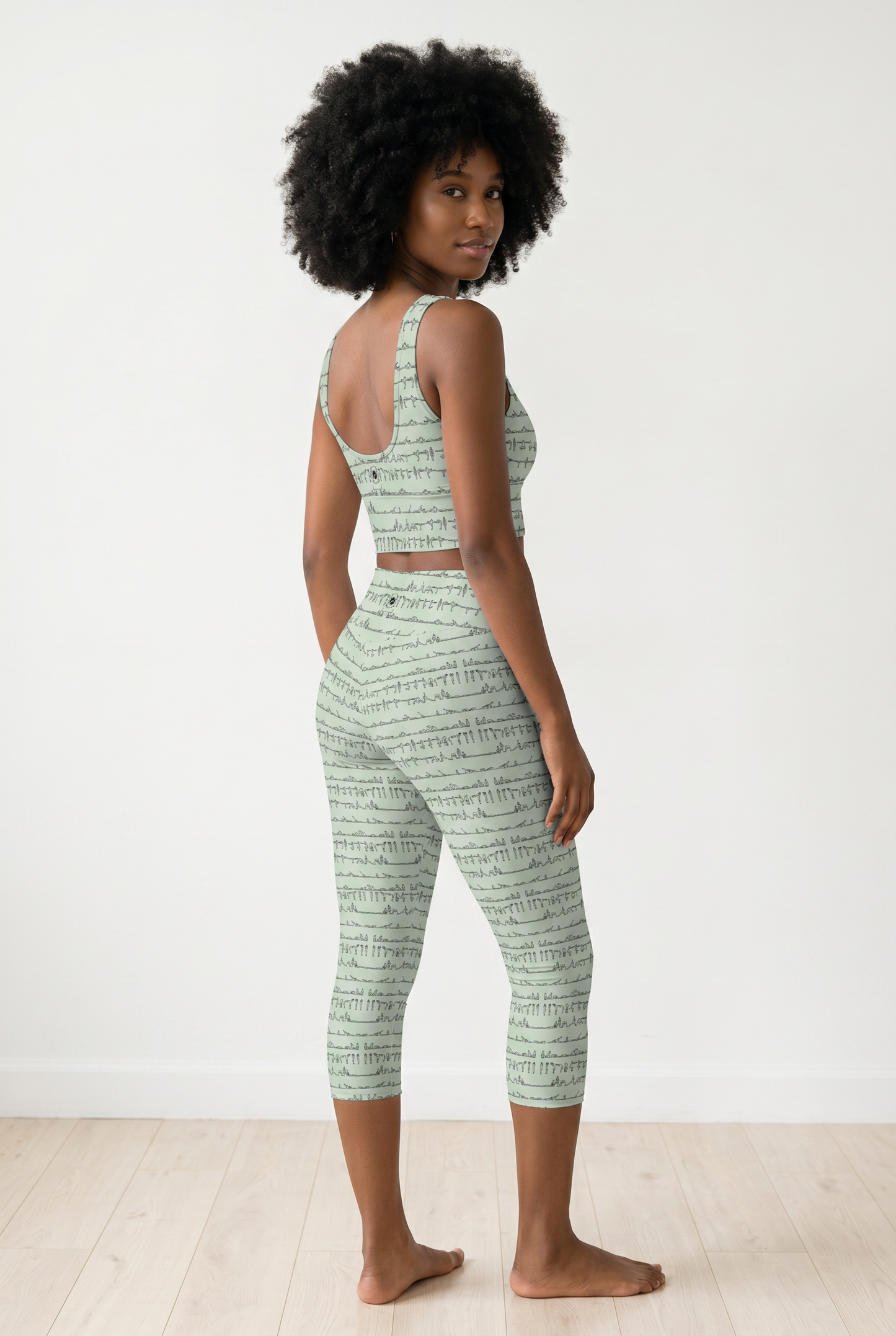 Bikram Pastel iSquared Crop Top with U-back, removable pads, cropped fit, and pastel all-over print
