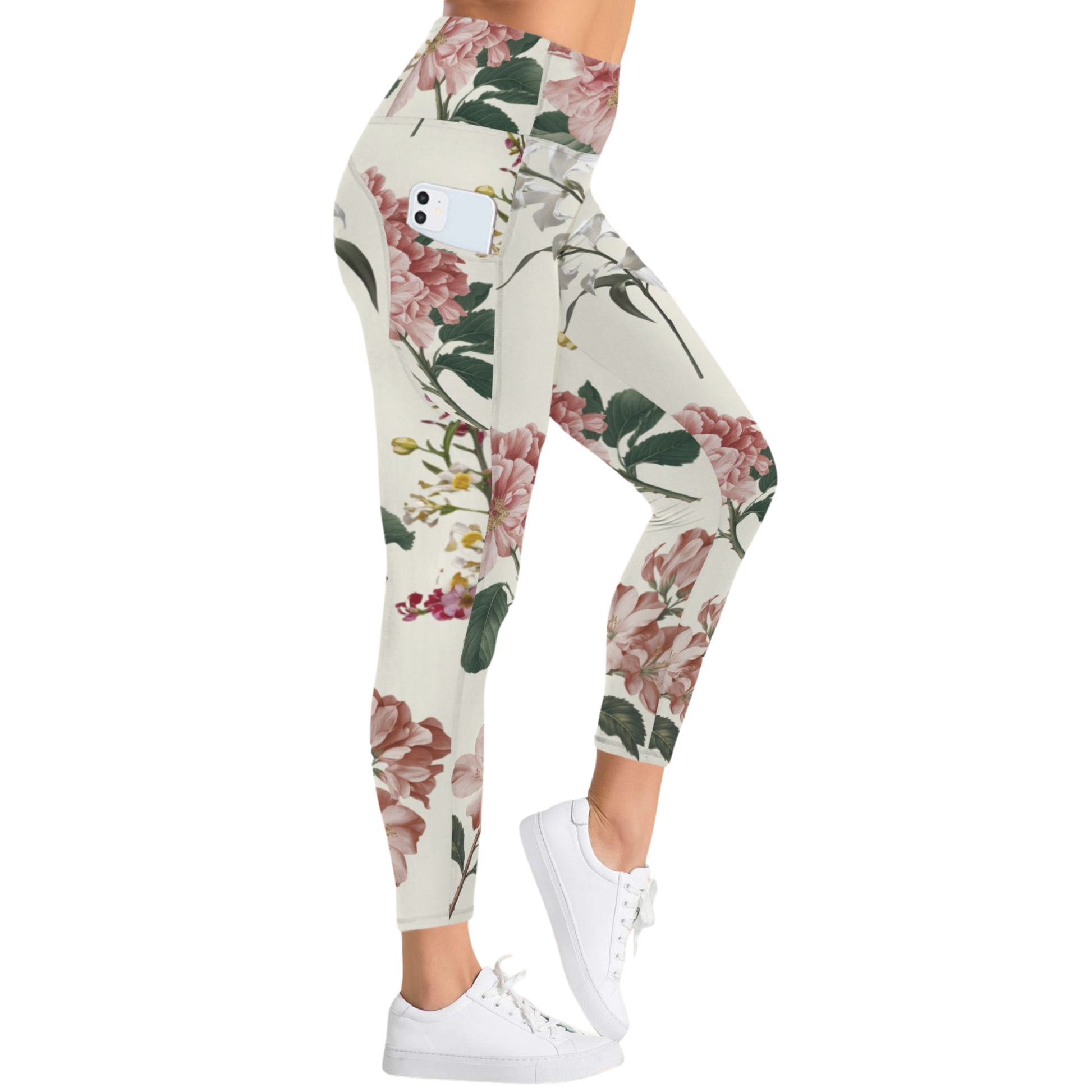 High-rise pocket leggings in a botanical floral print, featuring a snug fit and paired with white sneakers.